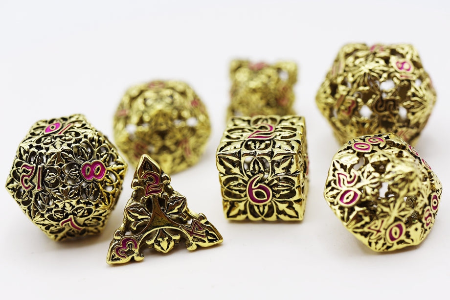 FBG4231: Fleur de Lis: Gilded Magenta Hollow RPG Metal Dice Set